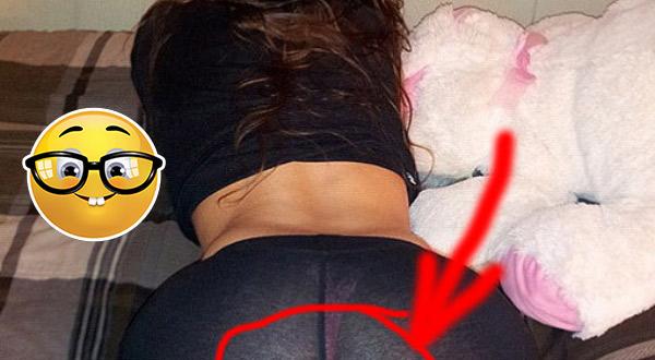 Her thong is visible because of her see-through yoga pants 